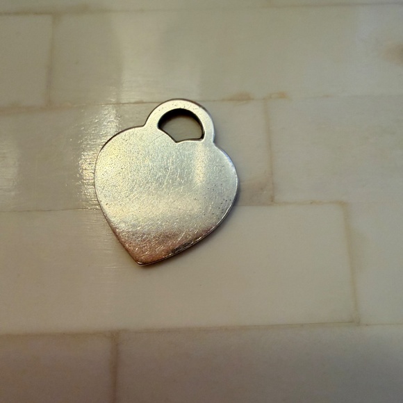 Tiffany & Co. Sterling Silver Rerun to Tiffany Charm - Picture 3 of 4